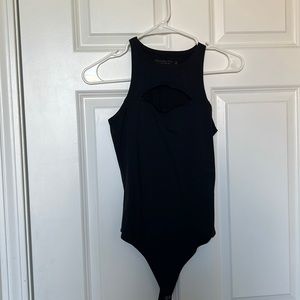 Black body suit with slit